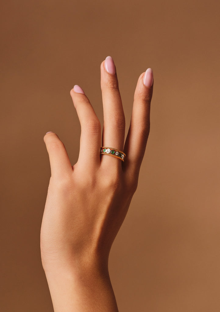 Adorned Emerald and Diamond Ring