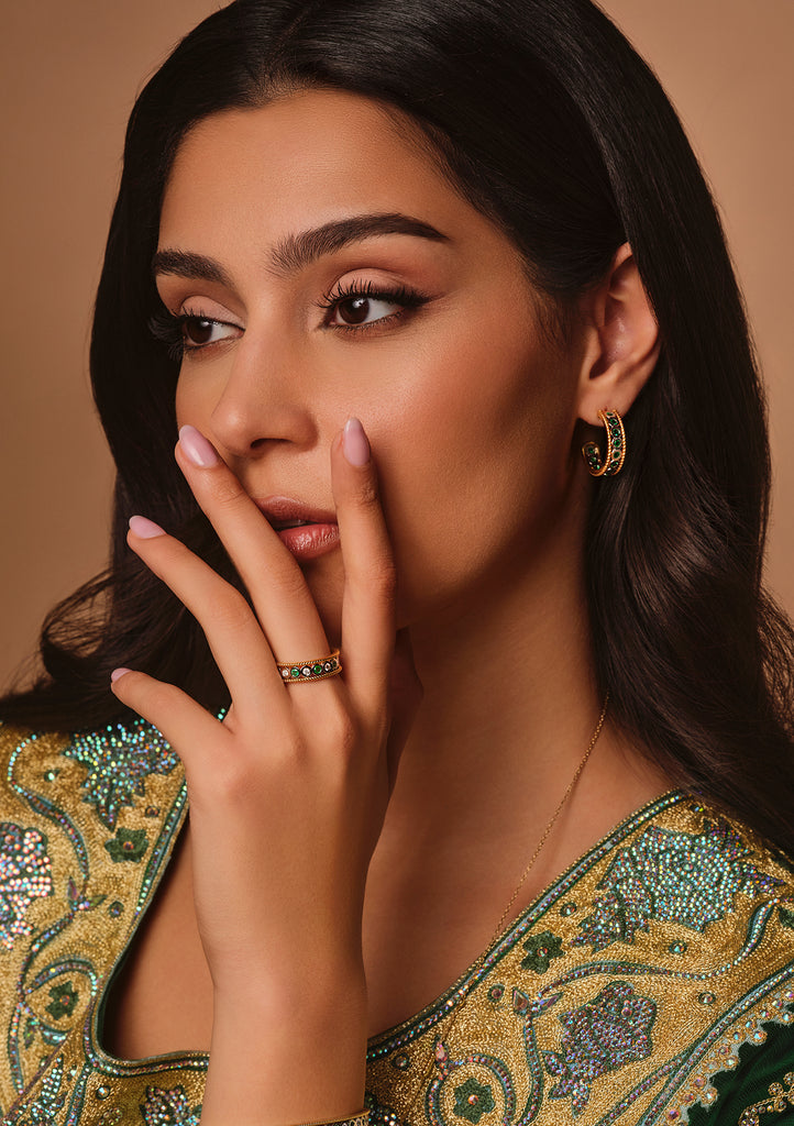 Adorned Emerald and Diamond Ring